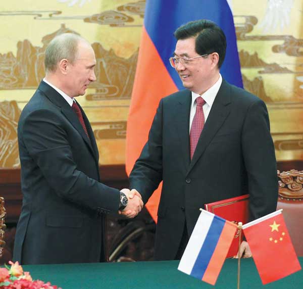 Hu, Putin pledge to boost China-Russia ties