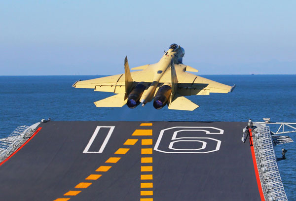 Jets land on China's 1st aircraft carrier