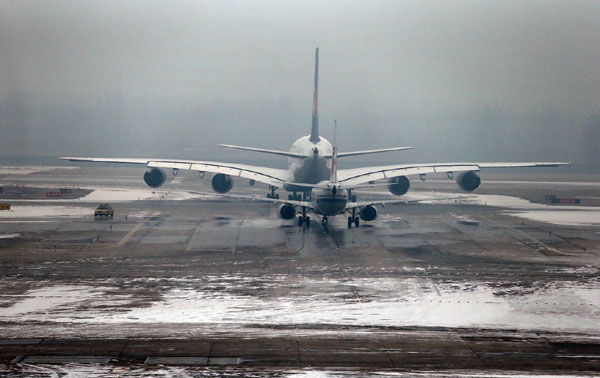 Snow slows traffic, grounds flights in capital