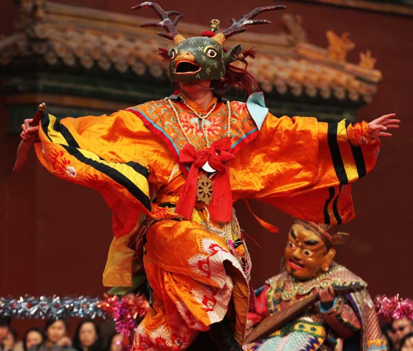 Lamas dance with the 'devil' at Beijing temple