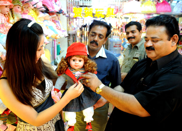 customers browsing a doll