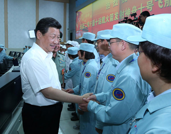 President Xi shares his joy with space program staff