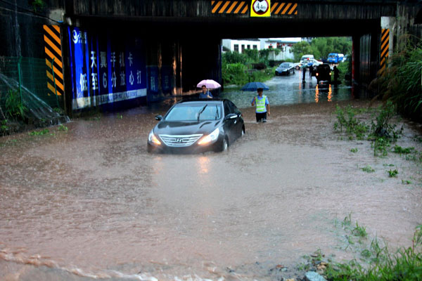 Rain-triggered floods kill 4 in E China