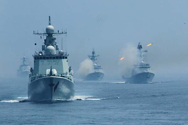 China, Russia vow regular naval exchanges