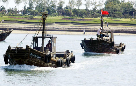 Dwindling catch sinking Chinese fishermen