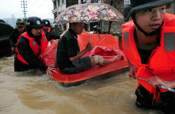 Typhoon weakens but traffic chaos lingers