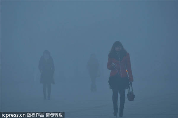 Fresh smog shrouds east, north China