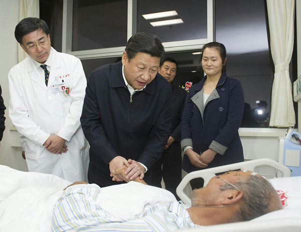 President Xi visits pipeline blast survivors