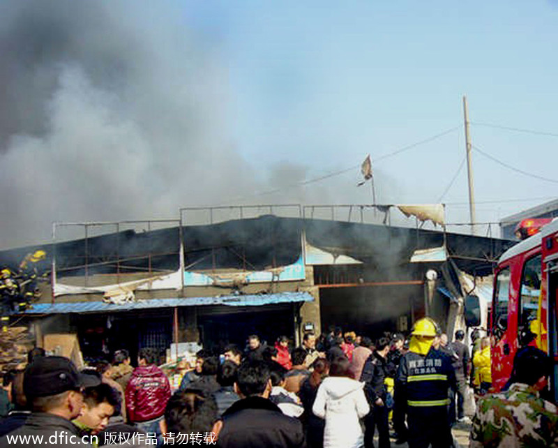 Girl missing amid fire in E China