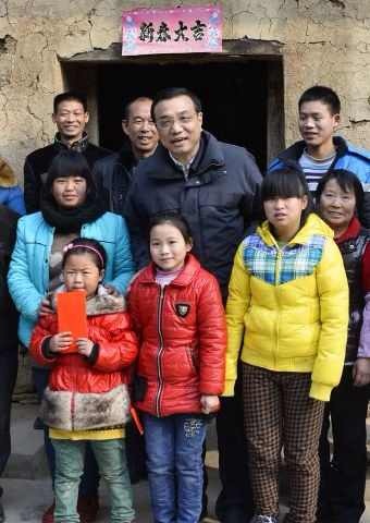 Li visits isolated county in NW China