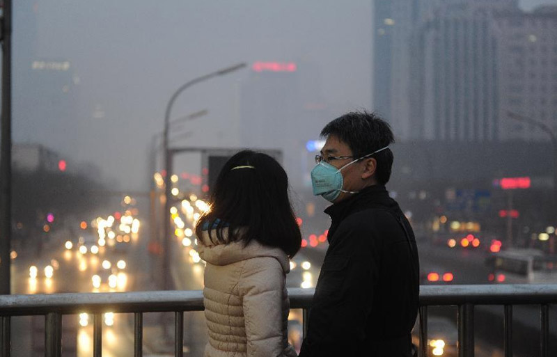Beijing upgrades haze alert from yellow to orange