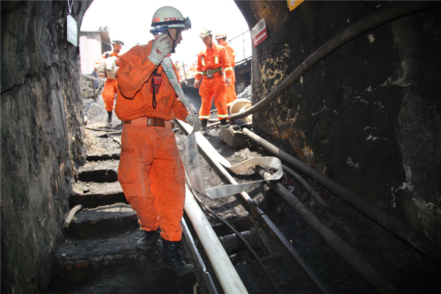 22 miners trapped in Yunnan coal mine flood