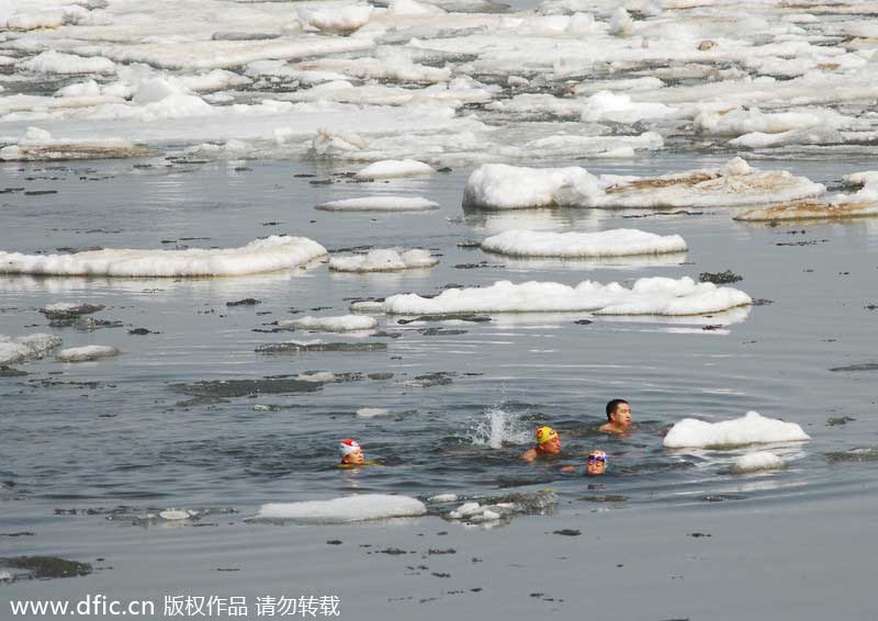 Swimmers take an icy dip in NE China