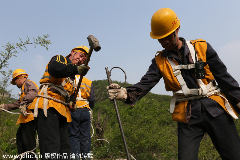 Workers to negotiate treacherous terrain