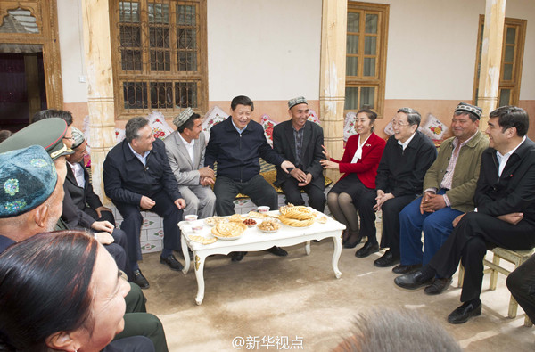 Xi visits border soldiers at Xinjiang base