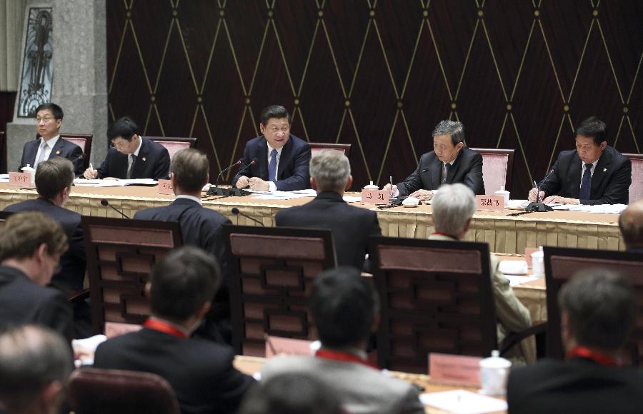 Xi takes note of advice by foreign experts