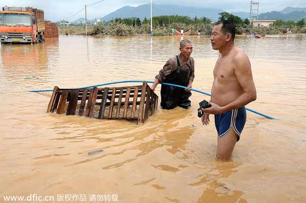 China rainstorms leave at least 26 dead
