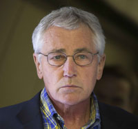 Rapid-fire questions turn up heat on Hagel