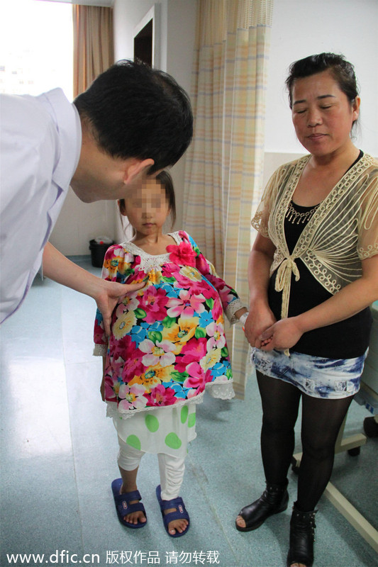 Guangzhou hospital offers hope to tumor girl