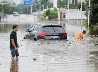 Rainstorms, floods plunge China into emergency response