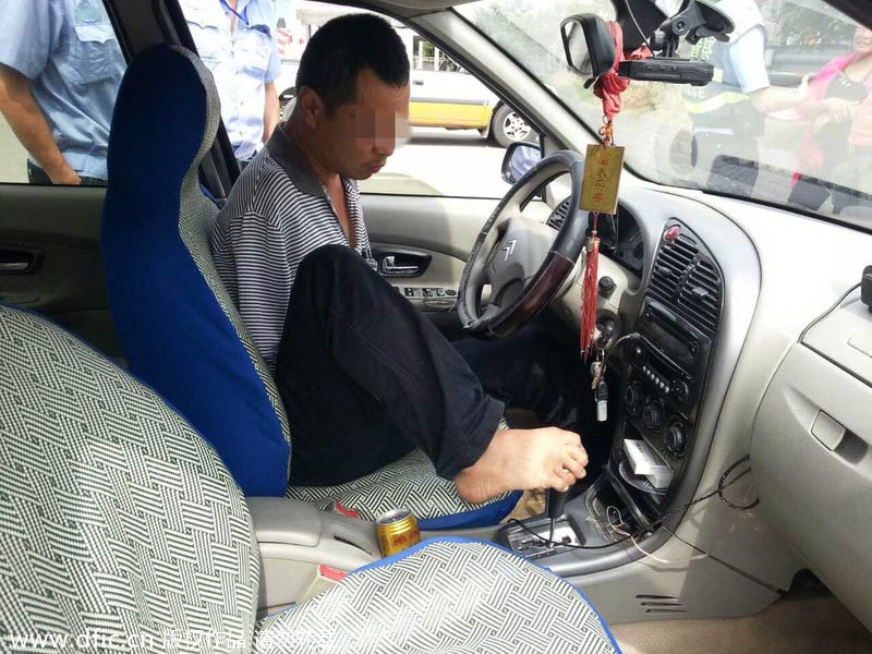 Armless man ticketed for driving without license