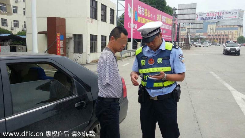 Armless man ticketed for driving without license