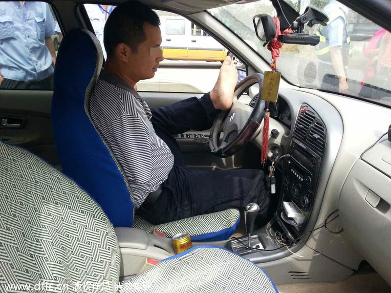 Armless man ticketed for driving without license