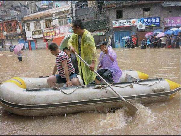 50,000 evacuated in Central China downpours