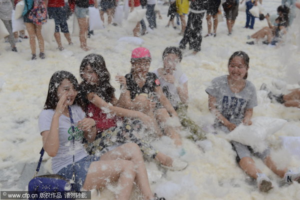 Feathers fly as pillow fight relieves stress of daily life