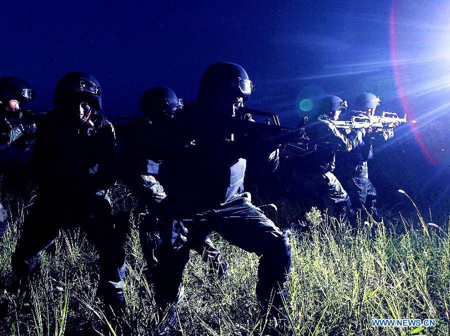 Armed policemen conduct combat exercises in Shanghai