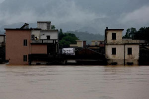 Rescuers pluck residents from raging torrent