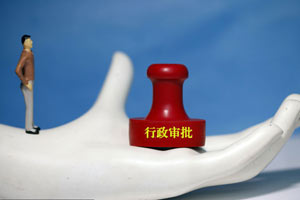 China cuts, decentralizes more government approvals