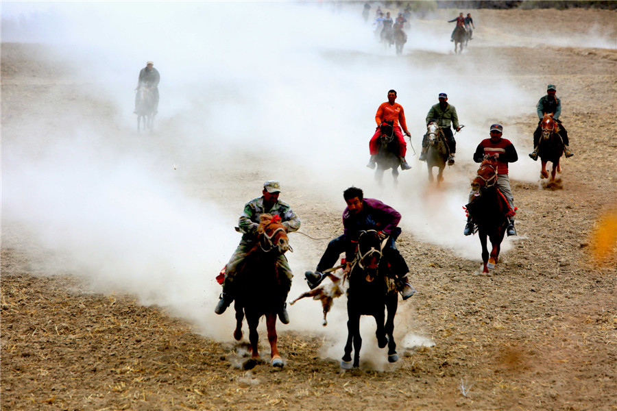 Herdsmen of Tajik ethnic group play traditional game