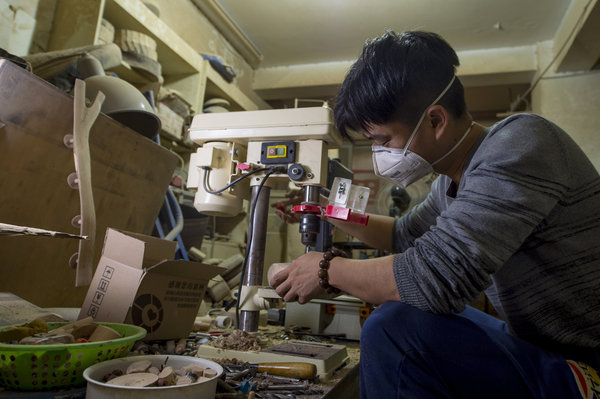 Young man makes living from ancient craft