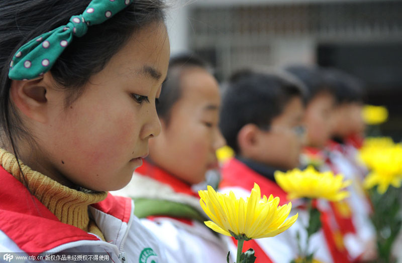 China marks first National Memorial Day