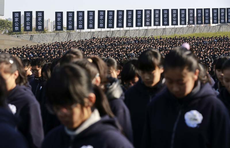 China marks first National Memorial Day