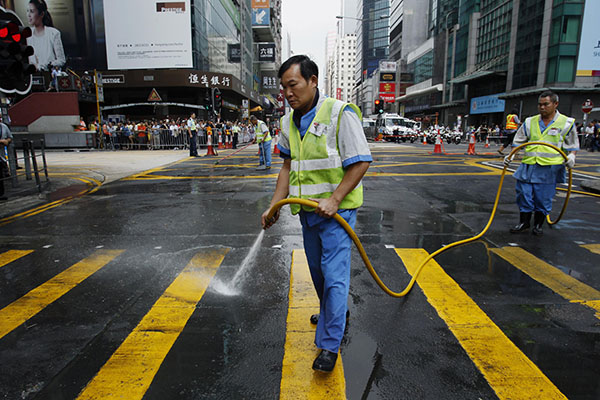 Police start clearance in HK's last protest zone