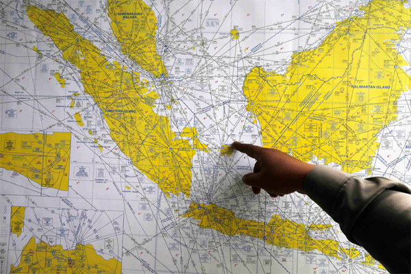 Chinese military jet, vessel join search for missing AirAsia flight