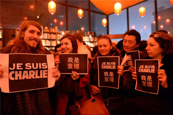 Foreign press mourns Paris victims in Beijing