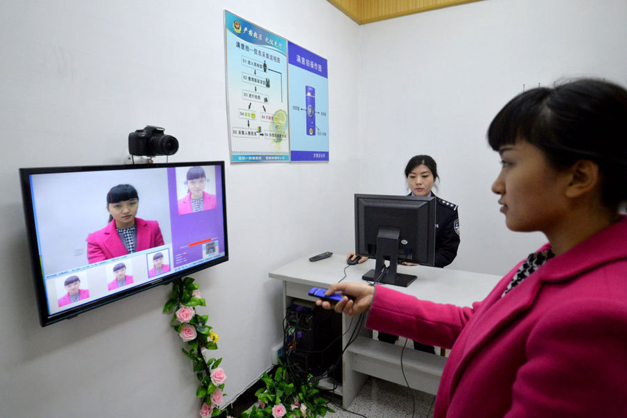 Taking selfie ID photo at police station