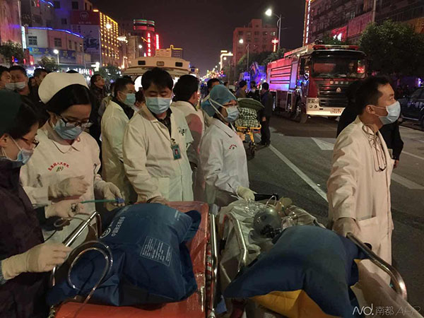 Over 10 trapped in fire-ravaged China marketplace