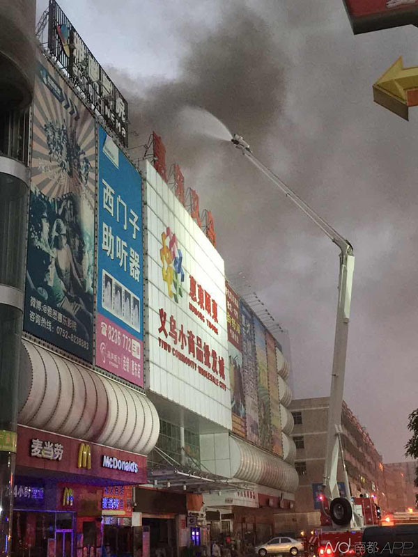 Over 10 trapped in fire-ravaged China marketplace