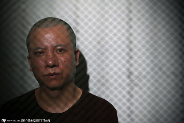 Chinese man compensated for 8 years wrongful custody