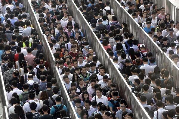 Beijing to keep population down
