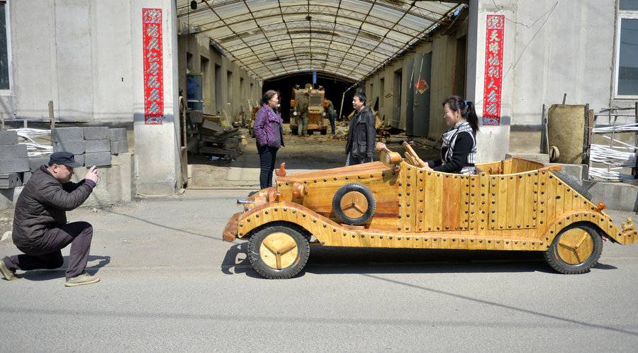Chinese man makes antique car out of wood