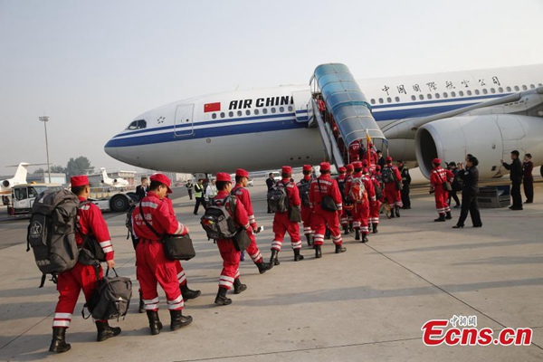 China Int'l search & rescue team leaves for Nepal