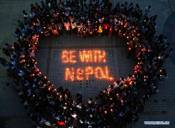Students pray for people trapped in Nepal earthquake