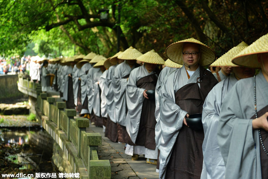 Monks walk for charity on birthday of Buddha