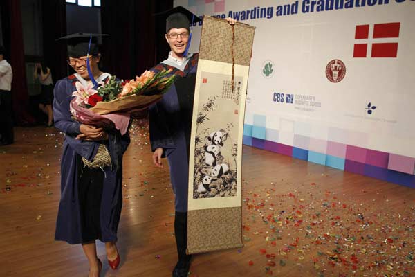 Twice blessed: new graduates are newlyweds