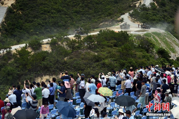 PLA holds military drill in HK, locals invited to observe